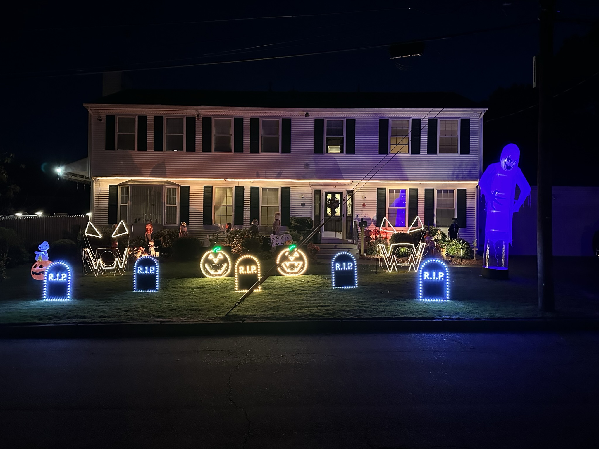 Halloween light display at 12 Shenandoah Road Warwick Rhode Island at night
